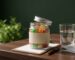 CBD gummies jar next to a checklist, illustrating the CBD gummies drug test question
